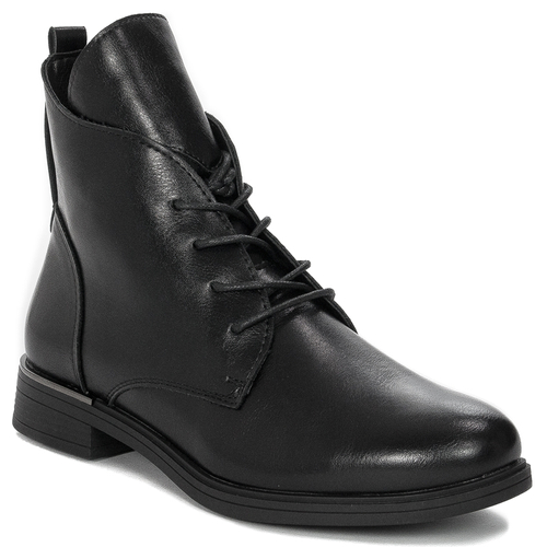 Black Sergio boots on an insulated platform