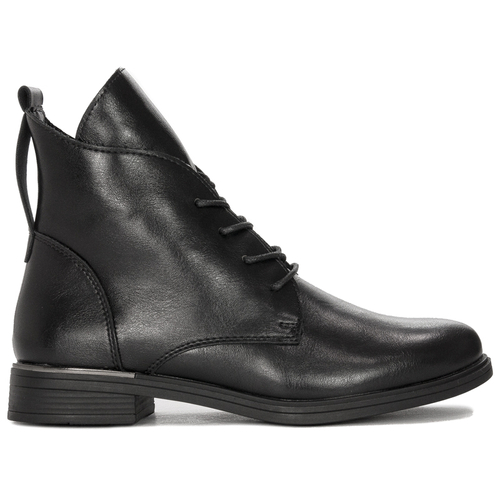 Black Sergio boots on an insulated platform