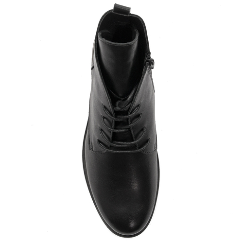 Black Sergio boots on an insulated platform