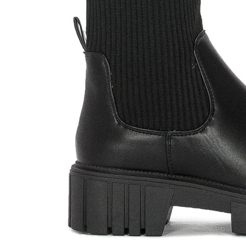 Black women's boots with a flexible uppers