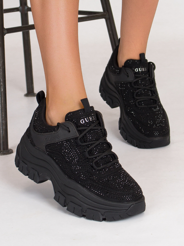 Guess Women's Black Sneakers on the platform