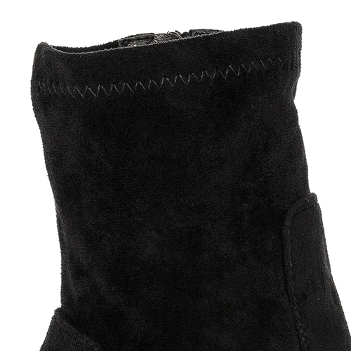 Women's Filippo boots on a black insulated post