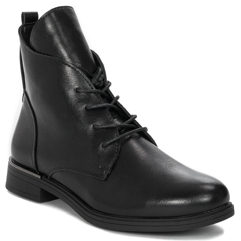 Black Sergio boots on an insulated platform