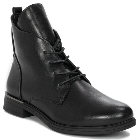 Black Sergio boots on an insulated platform