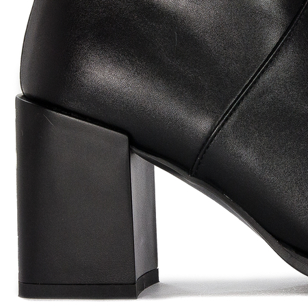 Filippo Black women's insulated boots on a post