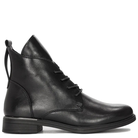 Black Sergio boots on an insulated platform